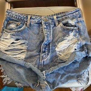 Ripped distressed denim shorts